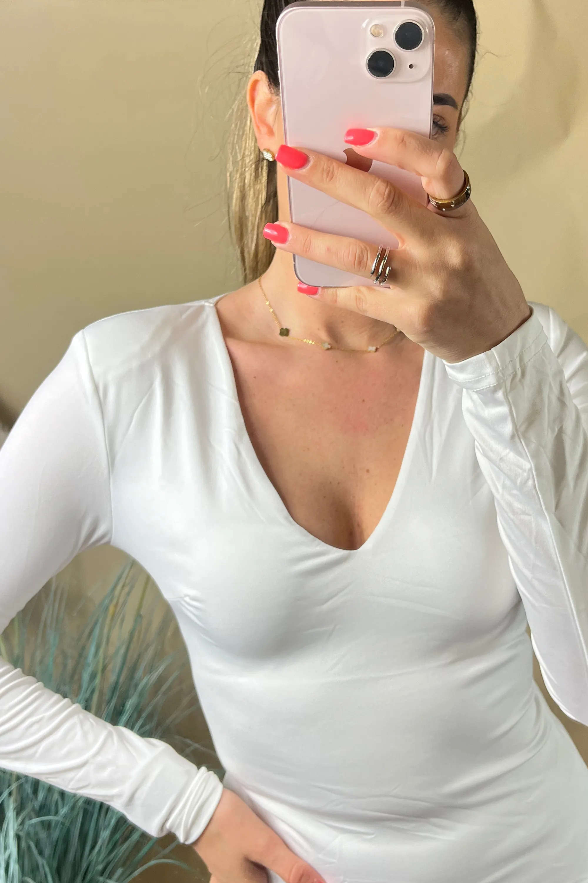 White plunge neckline bodysuit